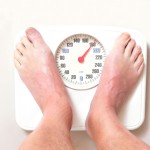 bigstockphoto_Man_On_Scale_____1282549